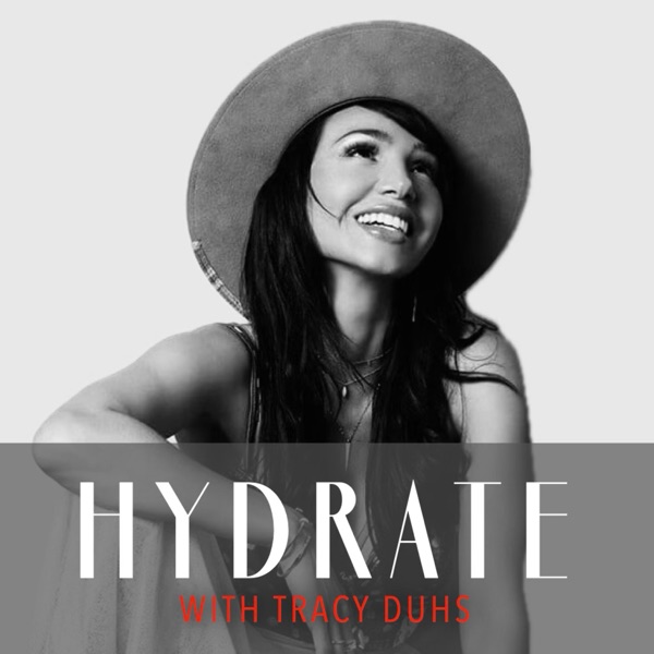 Cover art for HYDRATE with Tracy Duhs, a black and white photograph of the host in a wide brimmed hat.